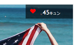 海で旗をたなびかせる少しワイルドな女の子の写真素材|GIRLY DROP ガーリードロップ